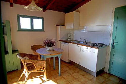 Dapur atau dapur kecil di Résidence Marina di Capitello