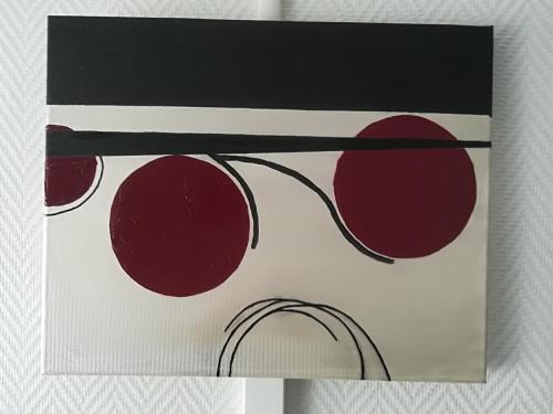 a painting of red circles on a white background at AUBERGE LE GABACHOU in Montpezat-de-Quercy