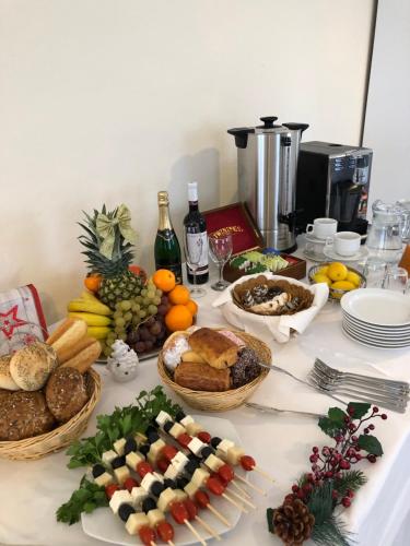 a table topped with lots of different types of food at Villa Anzio in Mariánské Lázně