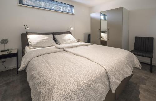 Ένα ή περισσότερα κρεβάτια σε δωμάτιο στο Veul oe thuus Hoeve Kroep an