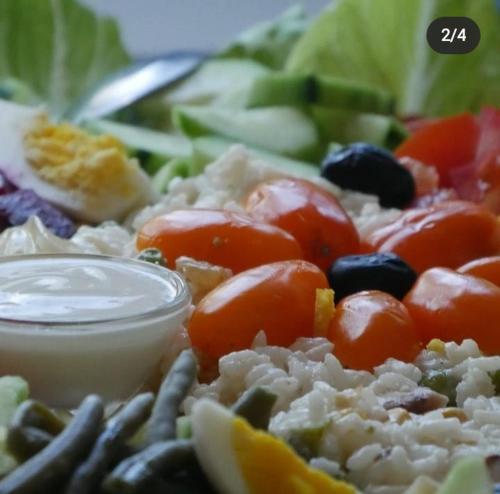 a plate of food with tomatoes and other vegetables at reda land in O Ben Slimane