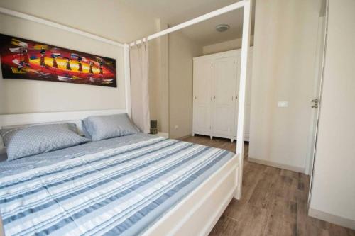 Posteľ alebo postele v izbe v ubytovaní Ca' Madeira