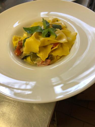 a bowl of food on a plate on a table at rest bellavista in Maloja