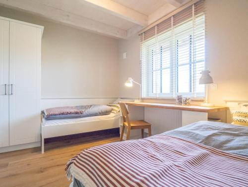 Giường trong phòng chung tại Villa-Holzreich