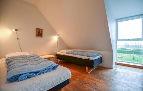 Postel nebo postele na pokoji v ubytování Lystrup Gamle Skole