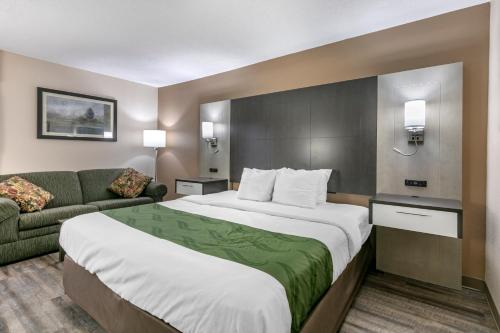 מיטה או מיטות בחדר ב-Quality Inn