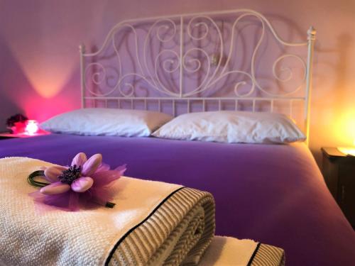 Una cama o camas en una habitación de B&B Ponte Rio