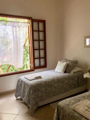 Katil atau katil-katil dalam bilik di Brotas Lodge