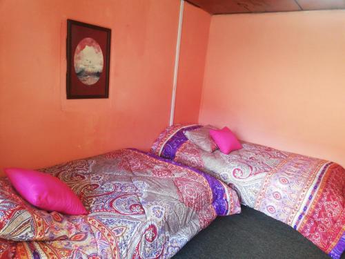 Cama o camas de una habitación en Montano Camping & Hostel