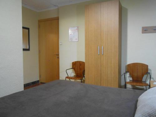 Katil atau katil-katil dalam bilik di Hostal El Callejón