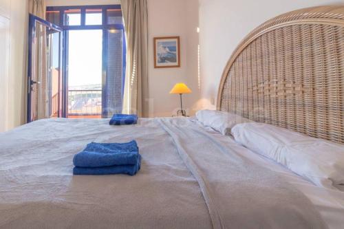 Una cama o camas en una habitación de Villa Meloneras - Exclusive Chill Out