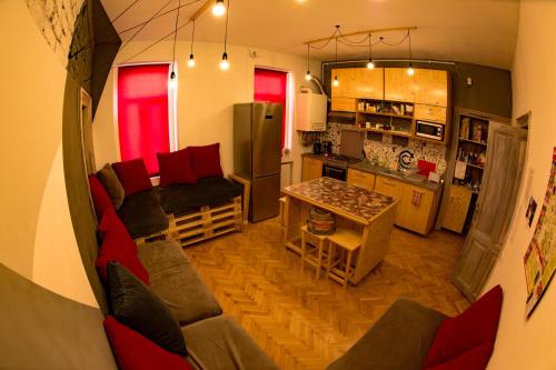 a view of a kitchen and a living room at Cloud 9 Living in Bucharest