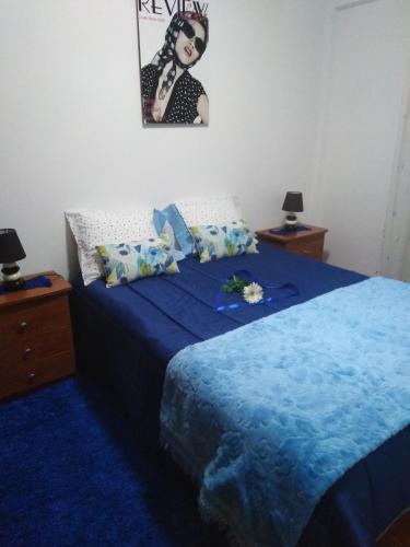 Ένα ή περισσότερα κρεβάτια σε δωμάτιο στο Apartamento Do Silva