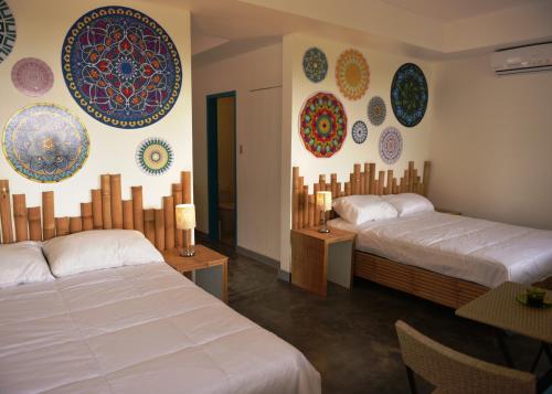 Giường trong phòng chung tại Lazuli Resort