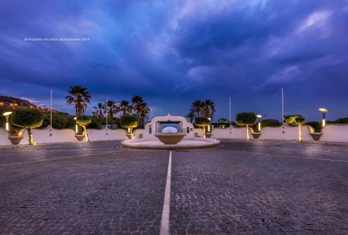 an empty parking lot at night with a cloudy sky at Hotel Kalithea in Kallithea Rhodes