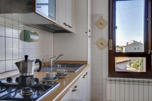 Kuchyň nebo kuchyňský kout v ubytování House Boè