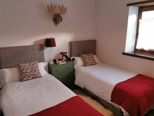 Ένα ή περισσότερα κρεβάτια σε δωμάτιο στο Privilege La Bonaigua