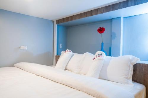 Postel nebo postele na pokoji v ubytování So Good Haad Rin Hostel
