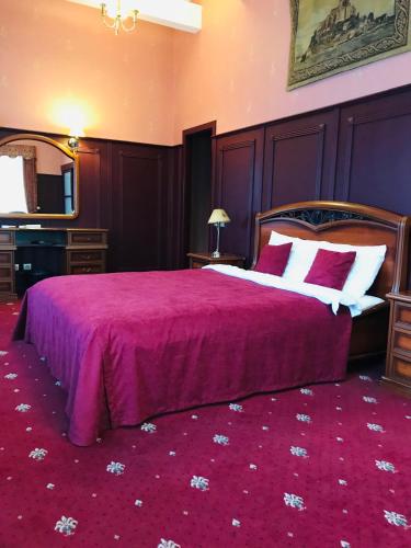 Ein Bett oder Betten in einem Zimmer der Unterkunft Aqvium