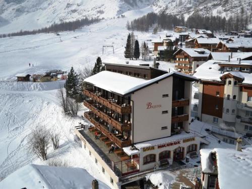 an aerial view of a hotel in the snow at Apartment Apartment Bristolino by Interhome in Saas-Fee