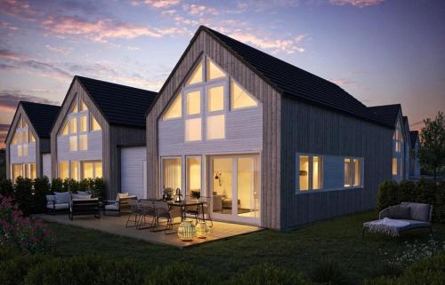 a rendering of a large house with a patio at Ferieparadis på sørlandet 2024 in Søgne