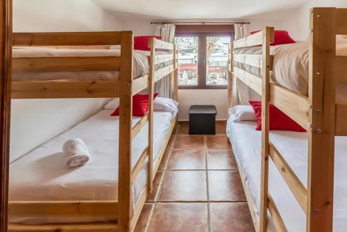 Двуетажно легло или двуетажни легла в стая в Bed and Snow Apartments