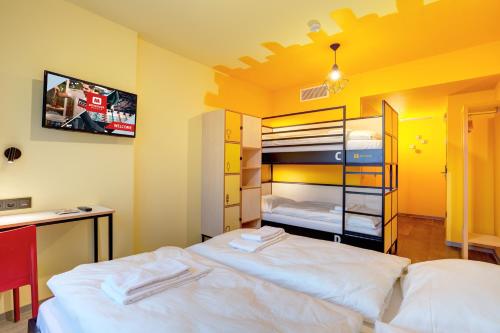 Katil atau katil-katil dalam bilik di MEININGER Hotel Lyon Centre Berthelot