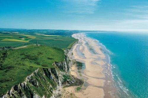 an aerial view of a beach and the ocean at Hôtel De La Plage in Calais
