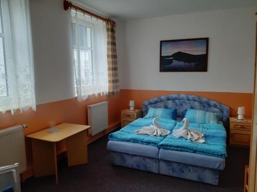 Postel nebo postele na pokoji v ubytování Pension Kobr