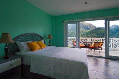 Ein Bett oder Betten in einem Zimmer der Unterkunft Sugarmon Villas