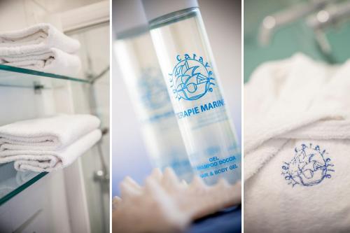 un tappo di una bottiglia d'acqua accanto agli asciugamani di Hotel Caravelle Thalasso & Wellness a Diano Marina