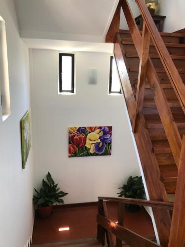 a staircase in a house with a painting on the wall at Hotel Europa in Ostende