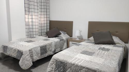 Postel nebo postele na pokoji v ubytování NG CANDELARIA - Tenerife