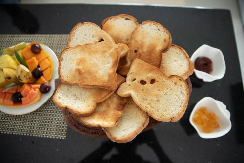 a plate of toast with bread shaped like dogs on it at White Castle in Wadduwa