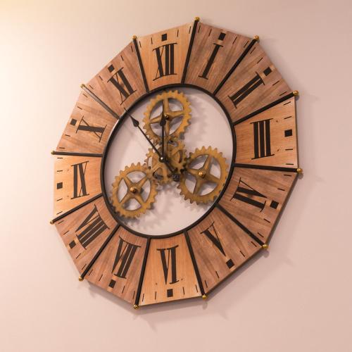 a wooden clock with roman numerals on a wall at Villa Domina in Split