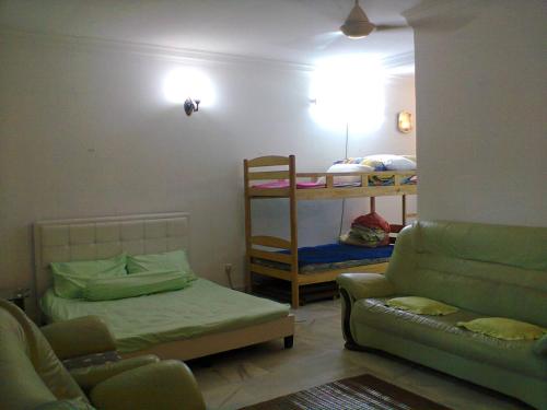 Postel nebo postele na pokoji v ubytování Jeffrey homestay Ipoh C @ G.hospital & Stadium Ipoh