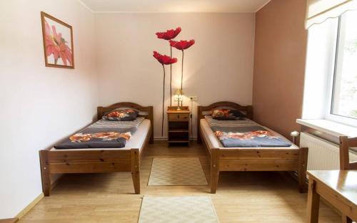 Postel nebo postele na pokoji v ubytování Vahe Guest House