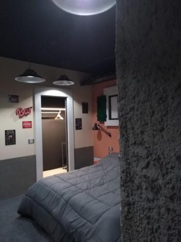 Postel nebo postele na pokoji v ubytování Thematic Rooms - AThema Atmosphere
