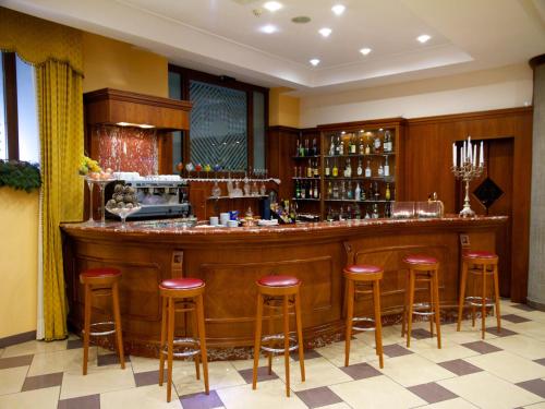 La sala de estar o bar de Ulisse Deluxe Hostel
