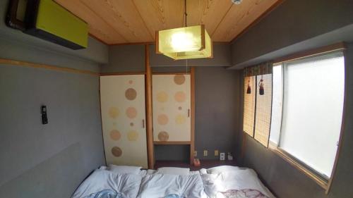 Кровать или кровати в номере Setouchi Triennale Hotel 303 Japanese style Art Female only - Vacation STAY 62189