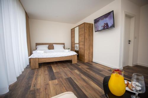 Postel nebo postele na pokoji v ubytování Villa Noel