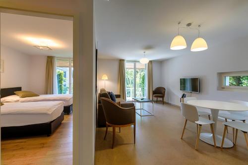 Voodi või voodid majutusasutuse Hôtel la Croix Blanche toas