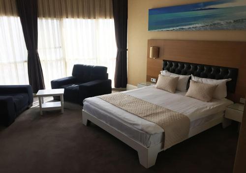 Giường trong phòng chung tại City Hotel Plovdiv