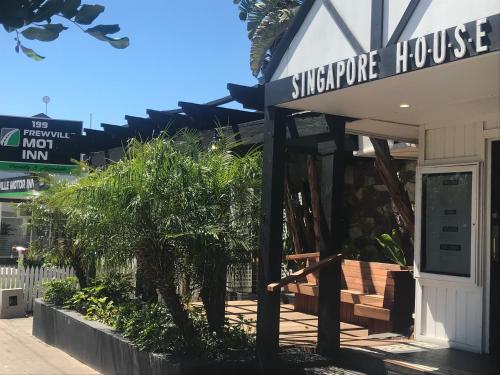a shop with a sign that reads whisperride house at Frewville Motor Inn in Adelaide