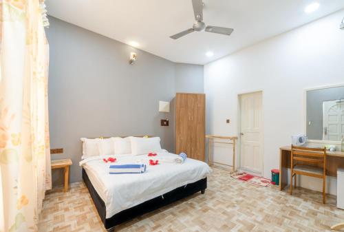 Ein Bett oder Betten in einem Zimmer der Unterkunft Koimala Beach Ukulhas