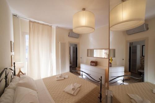 Postel nebo postele na pokoji v ubytování Hotel Spring