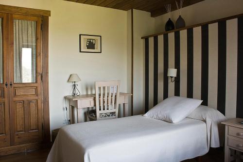 Giường trong phòng chung tại Posada Ruilobuca