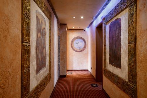 a hallway with paintings on the walls of a building at Art 'Otel in Sofia