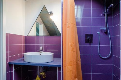 a bathroom with a sink and a mirror at 010 - Sant Anna loft VISTA MARE 150m dalla SPIAGGIA in Sestri Levante