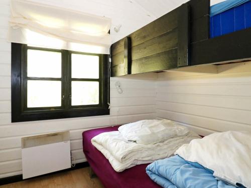 Postel nebo postele na pokoji v ubytování Holiday home Hadsund XXIV